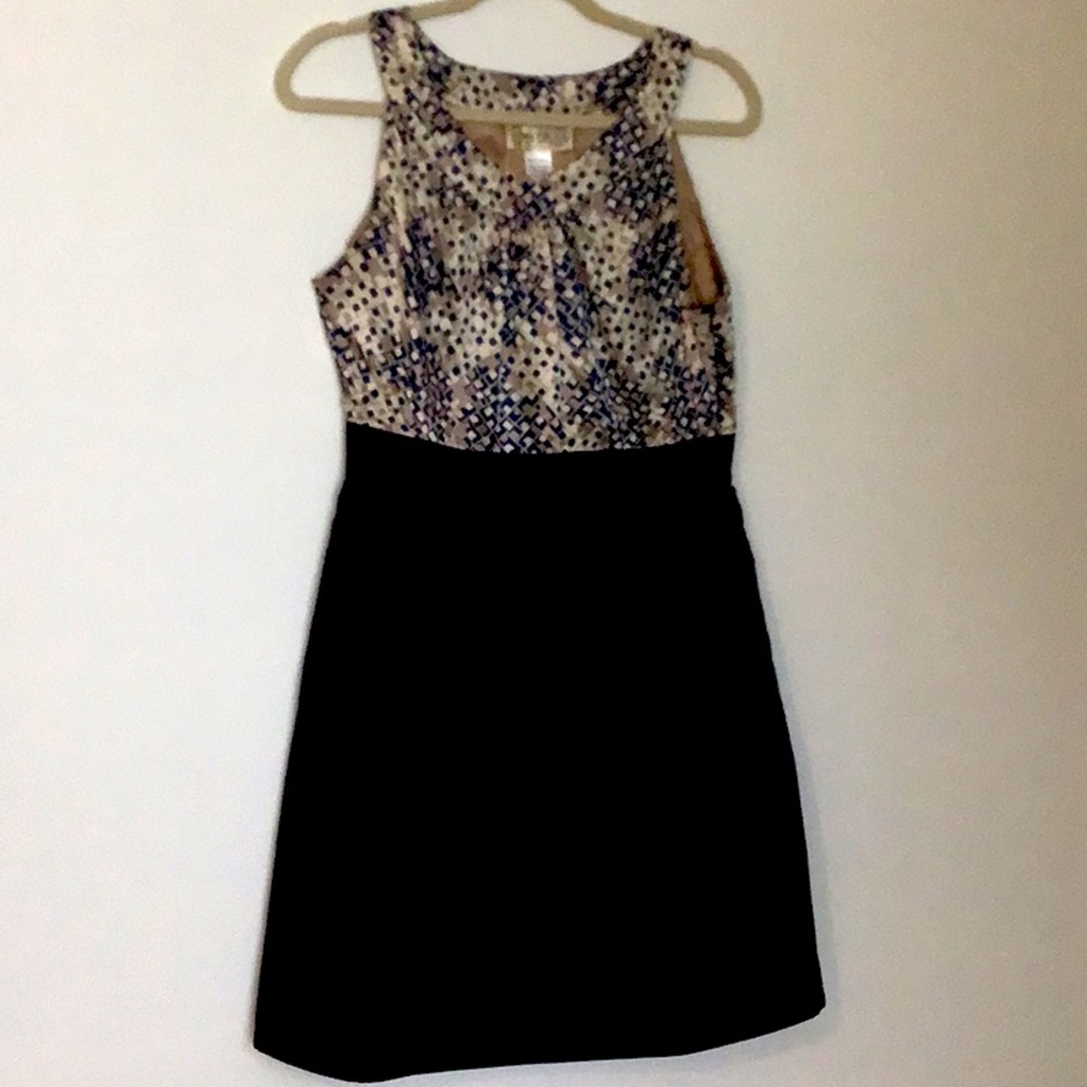 Francesca’s Collection Size L. Beige, turquoise top with black skirt/pockets.